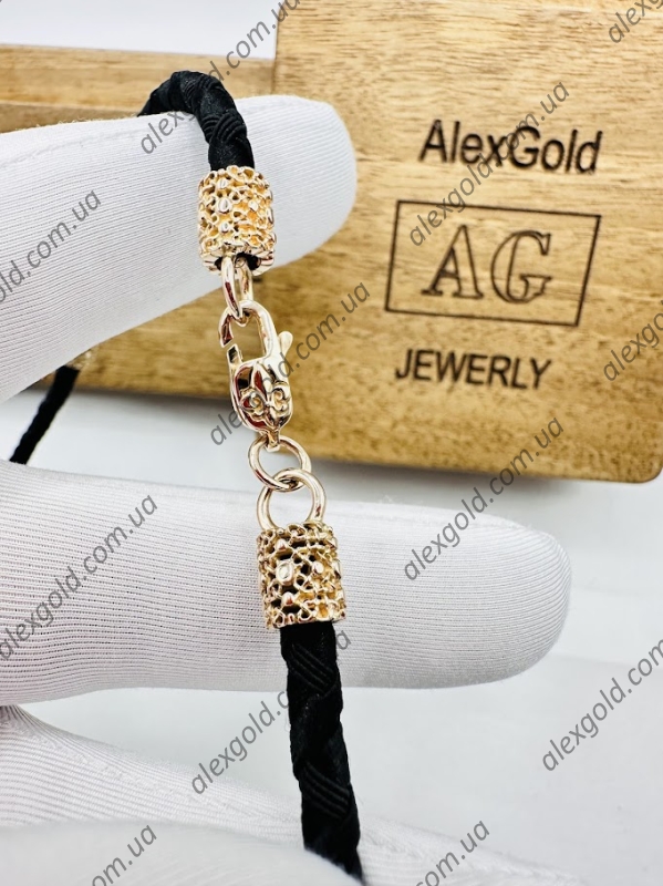 Шнурок з золотоми вставками та камнями вага 13.3г