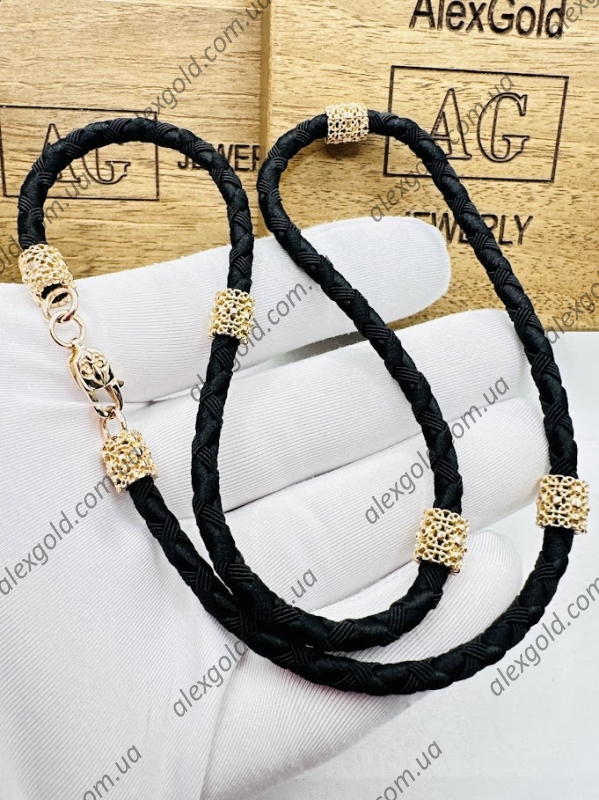 Шнурок з золотоми вставками та камнями вага 13.3г