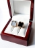 Золотые серьги Van Cleef c черными камнями вставками